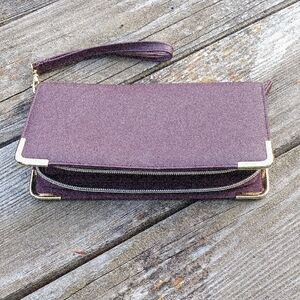 Elegant Purple Clutch with Gold Accents